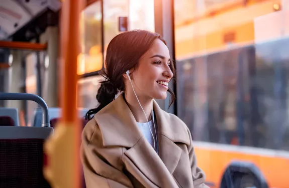 Woman seated on bus
