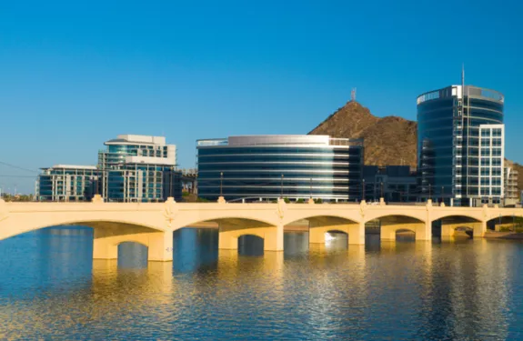 Phoenix suburb, the satellite city of Tempe, with the Tempe city skyline, Hayden Butte (hill), Tempe Town Lake (part of Salt River), and Mill Avenue Bridge