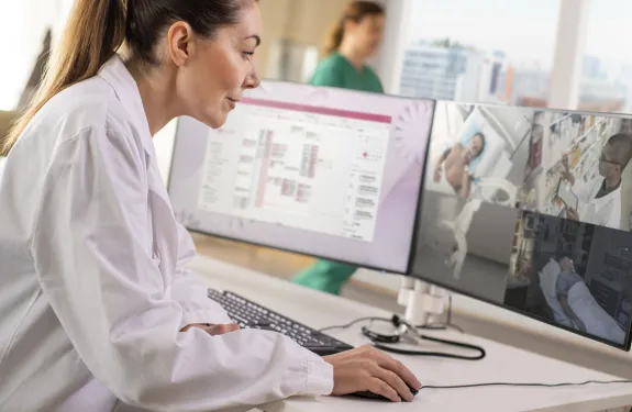 Doctor monitoring patients remotely