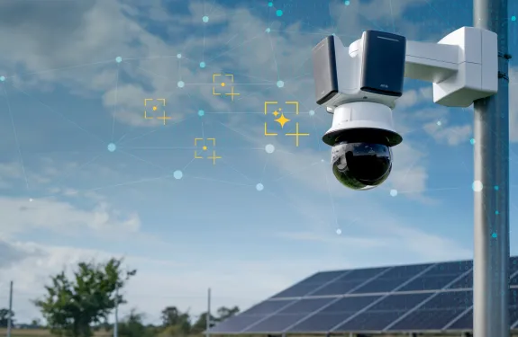 Pole with camera and radar mounted in solar plant environment