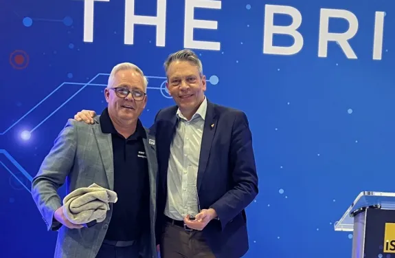 Fredrik Nilsson accepting Mission 500 Distinguished Humanitarian Award