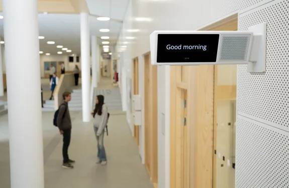 Network display speaker in school corridor
