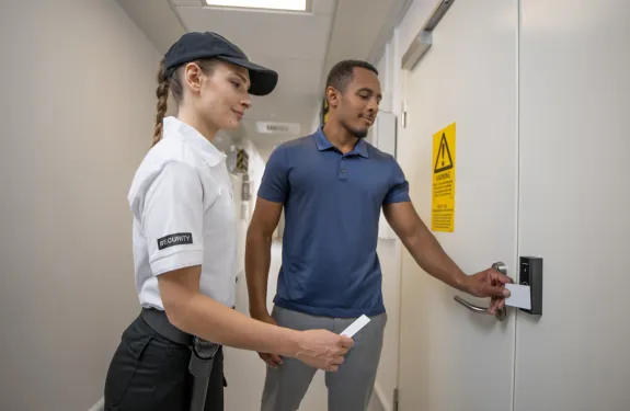Physical access control using multi-factor credentials