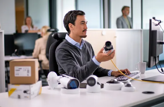 Man attending a network camera course at work