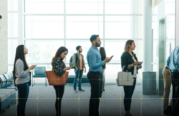 Customers wait in line at a financial institution.