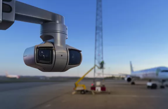 AXIS Q6215-LE mounted on a pole on an airport