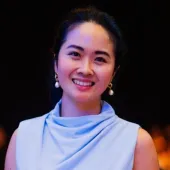 Picture of a woman, Novita Santoso, who is Key Account Manager at Axis Communications
