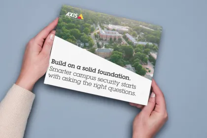 A person holding the eGuide "Build on a solid foundation"