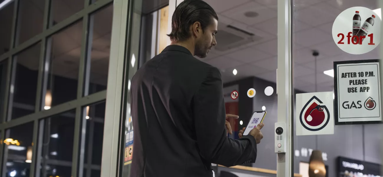 Man walking into gas station