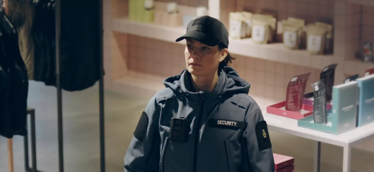 Woman with body worn camera