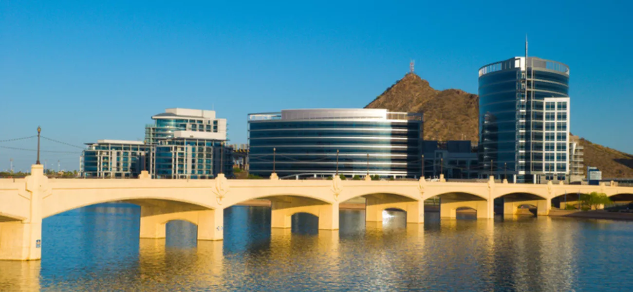 Phoenix suburb, the satellite city of Tempe, with the Tempe city skyline, Hayden Butte (hill), Tempe Town Lake (part of Salt River), and Mill Avenue Bridge