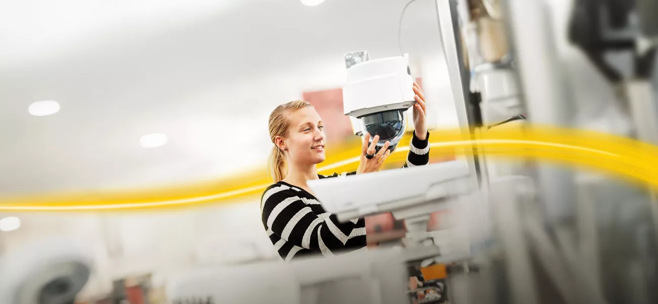 Woman installing camera