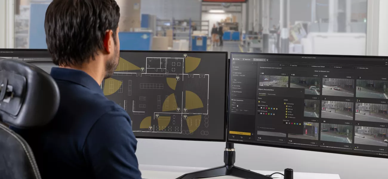 Man at computer using AI search capabilites