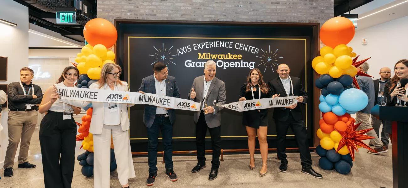 Karl Radke cuts the ribbon to open the Milwaukee AEC