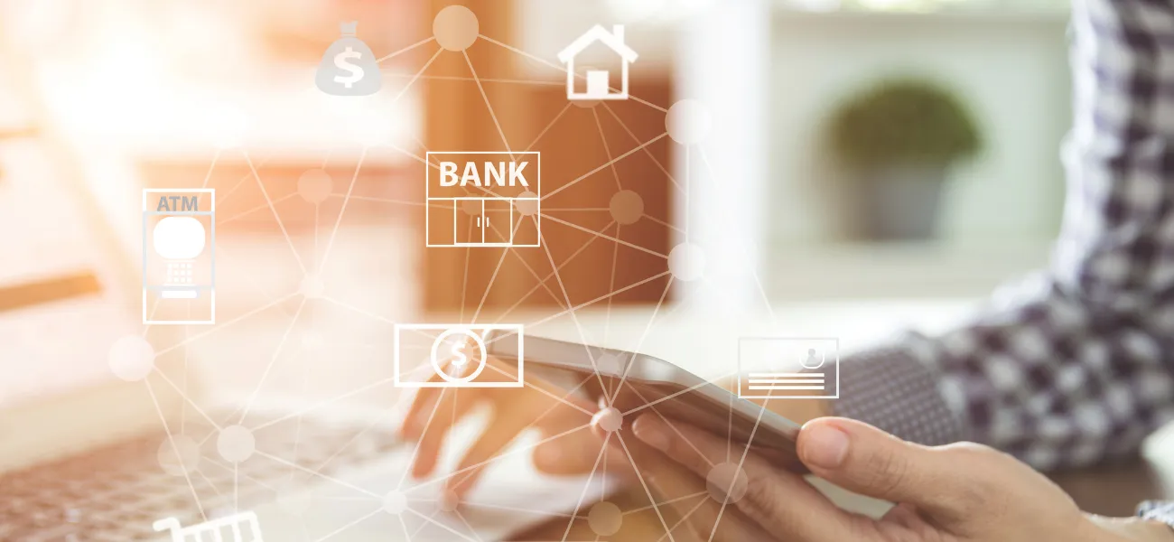 Image of a man checking his phone surrounded by banking and analytics symbols