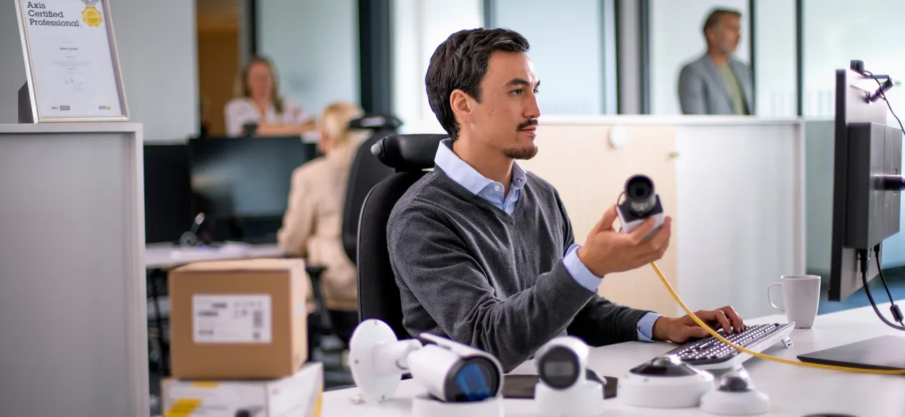 Man attending a network camera course at work