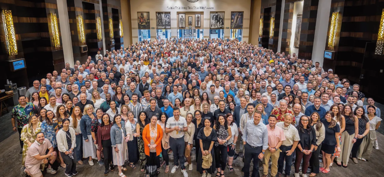 Over 700 employees from across the Americas gather together in a hotel foyer