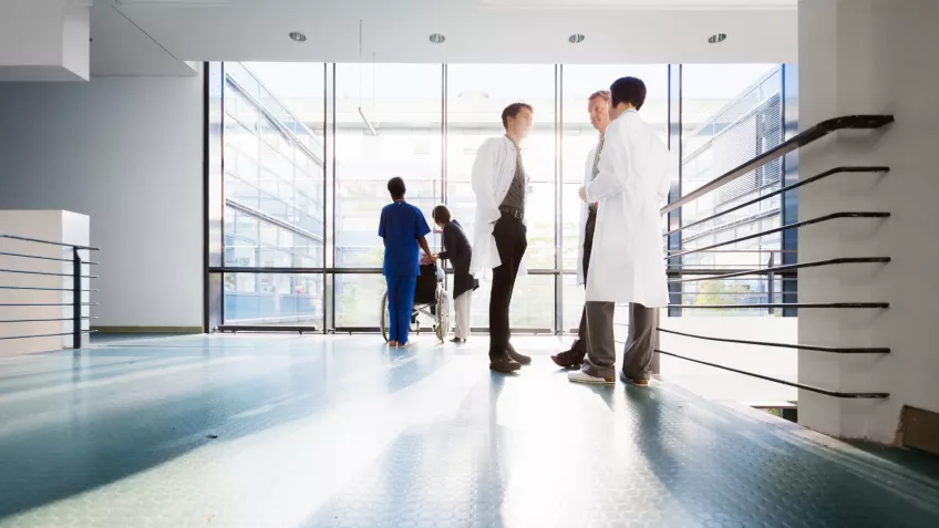 Hospital scene with doctors in hallway