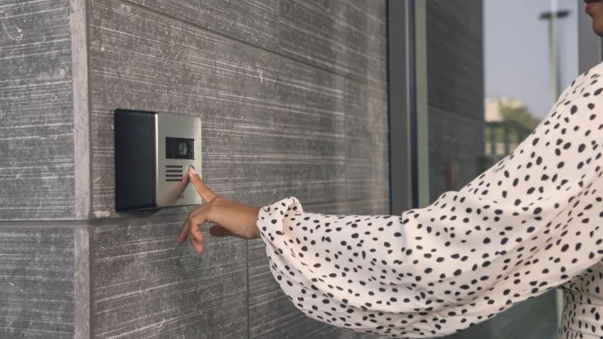 Women pushing button