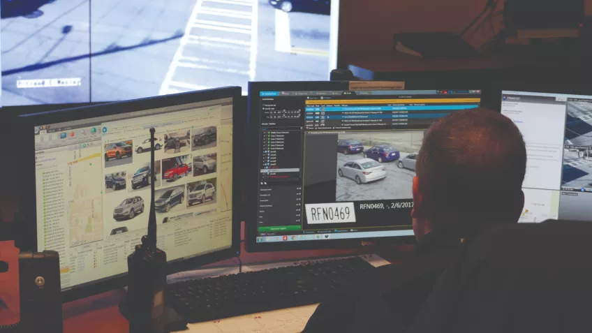 Man looking at monitors at the City of Atlanta.