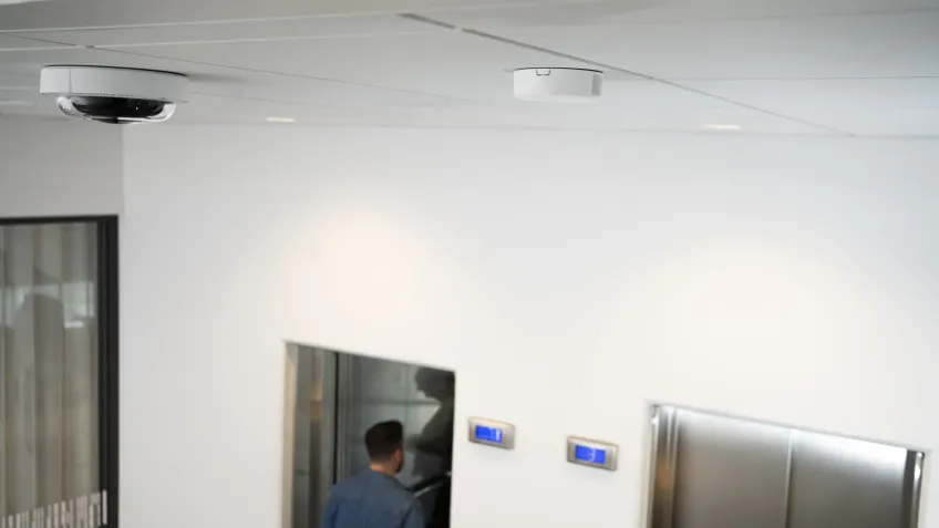An air quality sensor overlooking an elevator