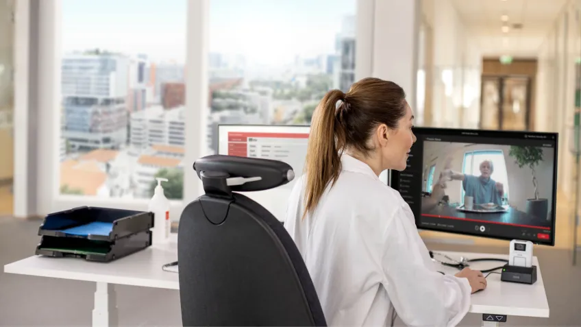 Virtual nurse charging a body worn camera