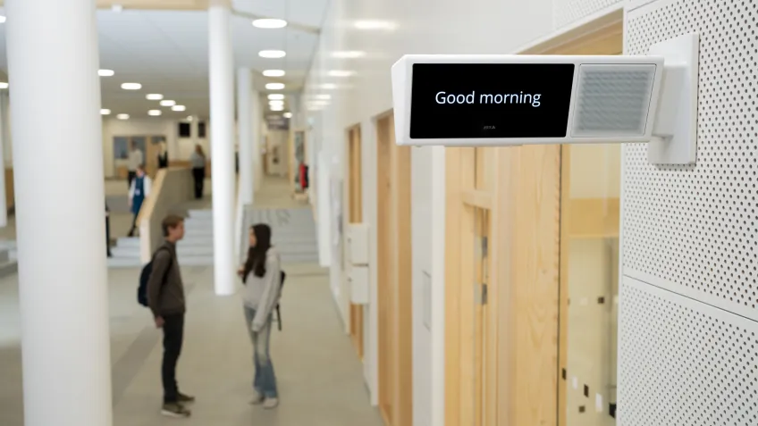 AXIS C1720 mounted in a school corridor