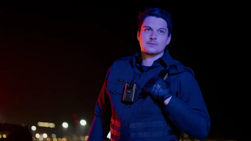 Correctional officer wearing a body camera