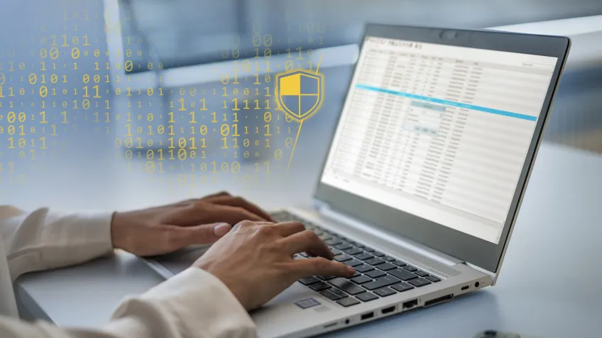 Computer screen with a cybersecurity overlay visualizing the need for technical documentation