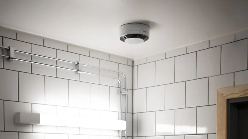 A vape detector installed in a school bathroom