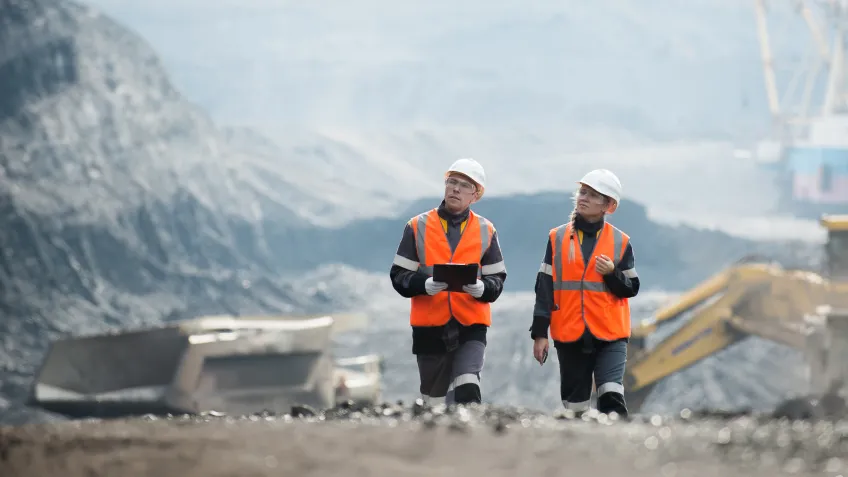 Two workers on a mine site, where safety solutions are important