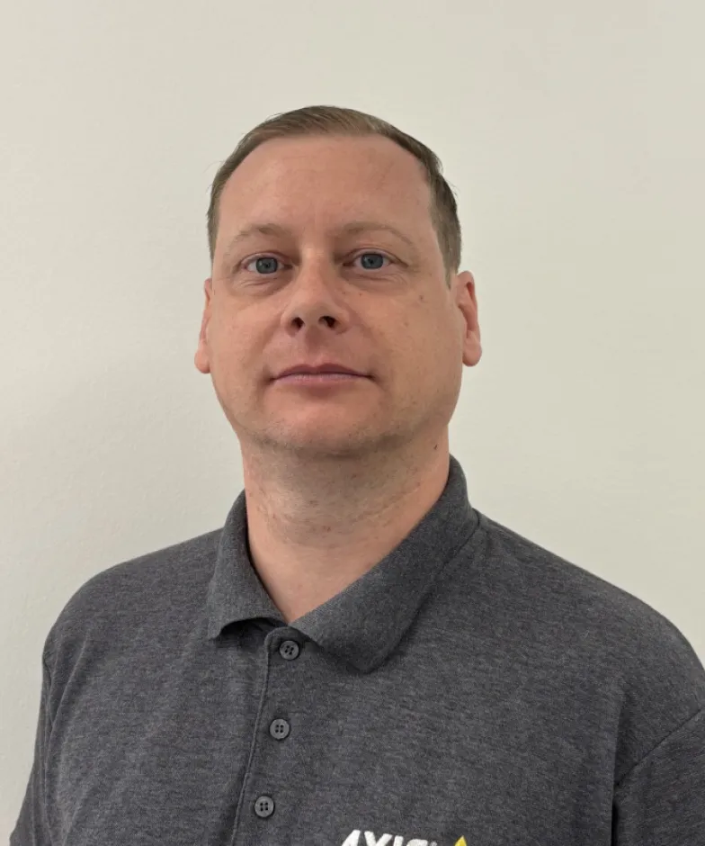 Headshot of Adam Wales